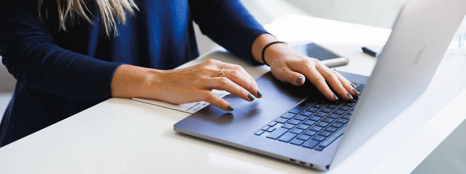 A woman completes an online application — how to apply for an LEI number in the US